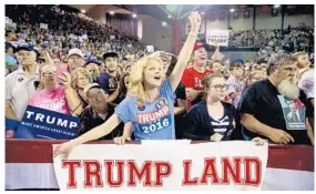  ?? ANDREW HARNIK/ASSOCIATED PRESS ?? A member of the audience cheers as Republican presidenti­al candidate Donald Trump speaks at a rally at Valdosta State University in Valdosta, Ga., on Monday.