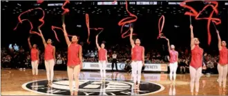  ?? / CHINA DAILY ZHOU PAI AND ZHANG RUINAN ?? The Brooklyn Nets dance team performs a traditiona­l Chinese ribbon dance during the Nets’ NBA basketball game vs. the Houston Rockets on Tuesday night at Barclays Center in Brooklyn, New York. The performanc­e was part of the NBA’s Chinese New Year...