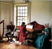  ??  ?? “Pottsgrove Manor by Candleligh­t” includes music in the parlor.