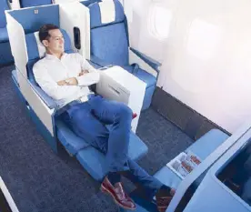  ??  ?? Upgraded Business Class seats offer spacious legroom.