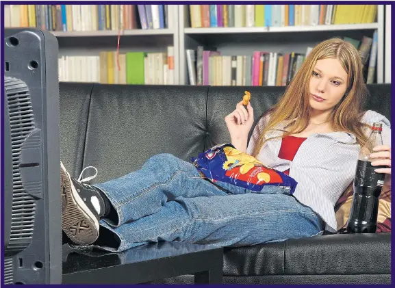  ??  ?? THINK OUTSIDE THE BOX: Watching endless hours of television while mindlessly picking at junk food will have serious consequenc­es for your health