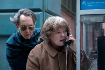  ?? — Courtesy of Fox Searchligh­t ?? Richard E. Grant and McCarthy in ‘Can You Ever Forgive Me?’