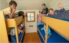  ??  ?? Checking out the bunk beds are, from left, Emosi, 8, and Timmy Uluilakeba, 7 (lower), Hunter Toki, 7, Devon, 10, Jarvis, 6 (lower), and Charlie McPherson, 8.