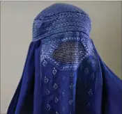  ?? FOTO: RAFIQ MAQBOOL/AFP/RITZAU SCANPIX ?? Den meget omdiskuter­ede burka saetter gang på gang sindene i kog i Danmark.