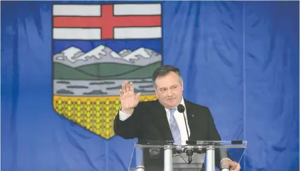  ?? JIM WELLS ?? Jason Kenney, seen Wednesday in Calgary, said despite winning the review by a narrow margin, 51.4 per cent, it was `clearly not adequate' for him to continue as UCP leader.