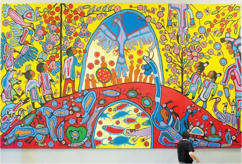  ?? ADRIAN WYLD / THE CANADIAN PRESS FILES ?? Norval Morrisseau’s painting Androgyny on display. There has been pushback on the issue of cultural appropriat­ion.