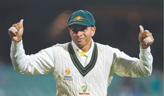  ?? ?? Usman Khawaja shows his more relaxed attitude as Australia’s 12th man in Adelaide as he has fun with the crowd..picture: Quinn Rooney/getty Images