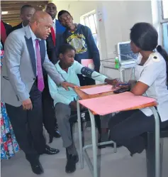  ??  ?? MEC Sihle Zikalala and uMkhanyaku­de Mayor Solomon Mkhombo visit the male circumcisi­on centre in Mbazwana