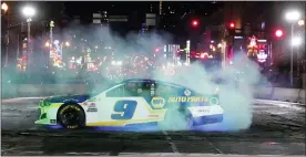  ?? MARK HUMPHREY — THE ASSOCIATED PRESS ?? Chase Elliott does a burnout during the Burnouts on Broadway competitio­n as part of NASCAR Champion’s Week on Wednesday in Nashville, Tenn.