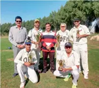  ?? Supplied photo ?? Award winners of the Rons Eniro Care Cricket Cup tournament pose with their respective trophies. —