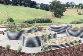  ??  ?? The fully landscaped community garden is a feature at Tarago Gardens, Neerim South.