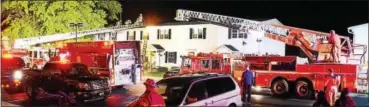  ?? TOM KELLY III — FOR DIGITAL FIRST MEDIA ?? Firefighte­rs battle a multi-alarm fire at Rolling Hills townhouses on Oct. 9. The electric fire was caused by a malfunctio­ning exhaust fan in a second floor bathroom.