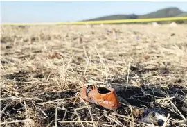  ??  ?? A shoe of a passenger is seen at the scene of the Ethiopian Airlines Flight ET 302 plane crash, near the town of Bishoftu, southeast of Addis Ababa, Ethiopia, March 10, 2019. (Reuters)