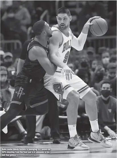  ?? NUCCIO DINUZZO/GETTY IMAGES ?? Bulls center Nikola Vucevic is averaging 19.3 points on 50% shooting from the field and 12.8 rebounds in his last four games.