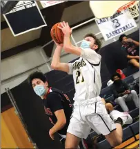  ?? Photos by Ernest A. Brown ?? Burrillvil­le’s Colby Bouzan, above, and Jaden White helped the No. 3 Broncos make 12 3-pointers in Saturday afternoon’s 54-44 Division II playoff win over Toll Gate at the Broncodome.