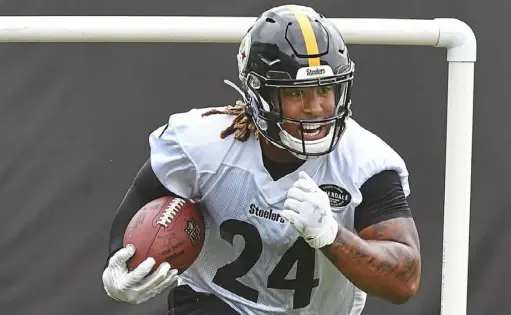  ?? Peter Diana/Post-Gazette photos ?? Fourth-round pick Benny Snell is likely to the be third man in the backfield behind running backs James Conner and Jaylen Samuels.
