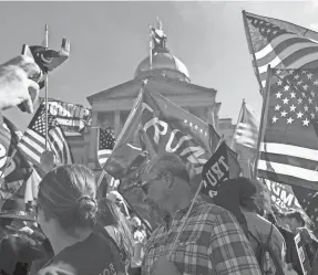  ?? BEN GRAY/AP ?? Supporters of President Donald Trump rally outside of the Georgia State Capitol in Atlanta on Saturday.