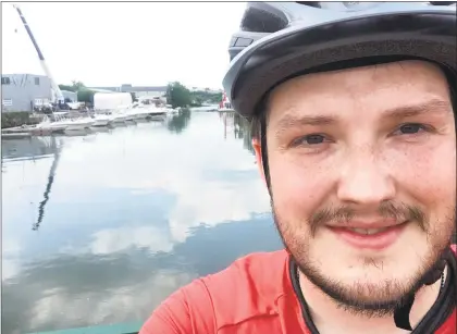  ?? Contribute­d photo ?? The Rev. Adam Yates of St. Stephen’s Episcopal Church in East Haddam has begun an 1,800-mile bike trip through New England for his summer sabbatical.