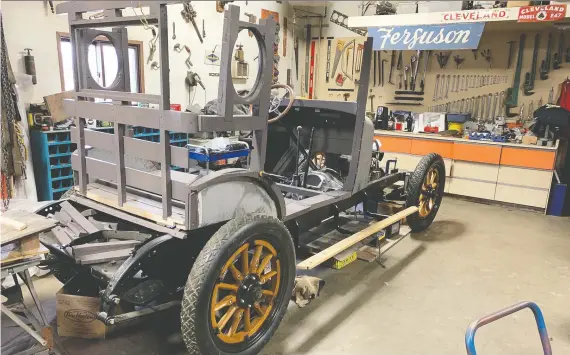  ?? KEN EDGECOMBE/DRIVING ?? A group from the Call of the West Museum is restoring this 1924 Haynes in Al Millard's shop in Okotoks. It will be displayed at the museum once completed.