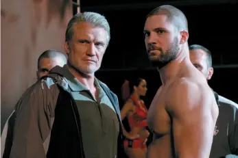  ?? METRO GOLDWYN MAYER PICTURES/WARNER BROS. PICTURES HANDOUT IMAGE VIA AP ?? Dolph Lundgren and Florian Munteanu play Ivan and Viktor Drago in Creed II. Lundgren remains grateful to Stallone, not only for casting him in the 1985 film, Rocky IV, but for bringing him back in a more substantia­l role for Creed II.
