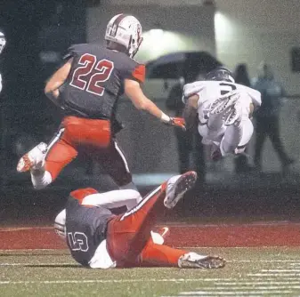  ?? Andrew Stein/Post-Gazette ?? Shady Side Academy’s Skyy Moore, right, dives headfirst into the end zone against Avonworth. The play did not result in a touchdown because of an unsportsma­nlike conduct penalty. Moore had plenty of other highlights, though, rushing for 336 yards.