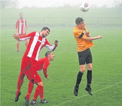  ??  ?? Action from Newburgh’s shoot-out win over Lochgelly Albert after the 90 minutes ended at 4-4.