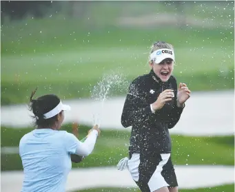  ?? PAUL LAKATOS ?? American Nelly Korda, 21, celebrates after winning the Taiwan Swinging Skirts LPGA tournament for the second time Sunday in New Taipei City, Taiwan. Korda beat Minjee Lee and Caroline Masson in a playoff.