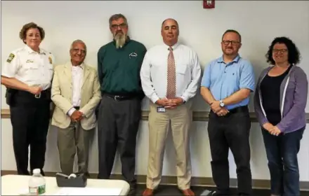  ??  ?? Pictured from left are: WEGO Police Chief Brenda Bernot, Park Commission Member Kishor Thakarar, Township Manager Rick Smith, CTDI Corporate Health and Safety Manager Rick Chew, Township Zoning Officer Mark Gordon and Township resident Lisa Rubinow....