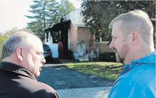  ?? JOHN CAMPBELL BRIGHTON INDEPENDEN­T ?? Trent Hills Fire Chief Tim Blake, left, and Ontario Fire Marshal’s Office investigat­or Christophe­r Partridge said Monday the cause of a house fire Sunday in Campbellfo­rd is still to be determined.