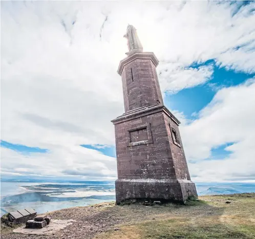  ?? ?? FALLEN IDOL: The Mannie – the statue of George Leveson-Gower – gazes from its pedestal above the east Sutherland coastline and the lands that he had cleared of people for sheep pasture.