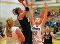  ?? AUSTIN HERTZOG - DIGITAL FIRST MEDIA ?? Spring-Ford’s Abby Goodrich goes up for a shot as Perkiomen Valley’s Megan Jonassen defends Thursday.