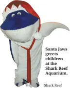  ?? Shark Reef ?? Santa Jaws greets children at the Shark Reef Aquarium.