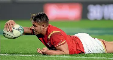  ?? PHOTOSPORT ?? Wales halfback Rhys Webb scores against the All Blacks last night.