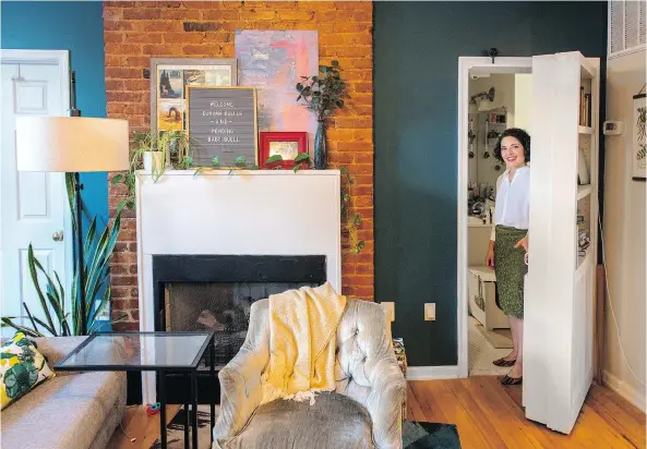  ?? BILL O’LEARY/THE WASHINGTON POST ?? Nicole Buell built a secret door that features a bookshelf on the living room side and opens to the bathroom in her 540-square-foot condo.
