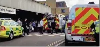  ??  ?? n SAD SCENE: Emergency services at Ealing Broadway Station after the tragedy