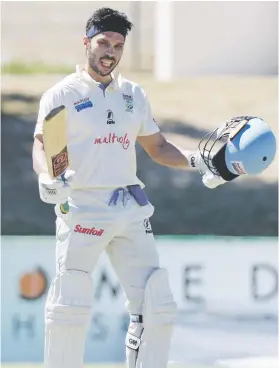  ?? Picture: Backpagepi­x ?? CRUCIAL. Titans batsman Farhaan Behardien celebrates after scoring his hundred during their Sunfoil Series match against the Cobras in Paarl yesterday.