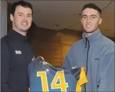  ??  ?? Jack Mitchell (Gormanston Col) receives his jersey from Ray McCabe.