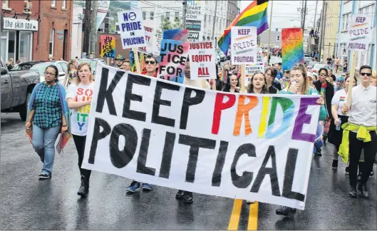  ?? DAVID MAHER PHOTOS ?? Pride started out as a protest and one group kept the spirit alive on Sunday.