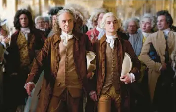  ?? APPLE TV+ ?? Michael Douglas, left, portrays Benjamin Franklin and Noah Jupe plays his grandson, Temple, in “Franklin.”