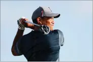  ?? AP PHOTO BY WILFREDO LEE ?? Tiger Woods tees off on the 13th tee during the first round of the Honda Classic golf tournament, Thursday, in Palm Beach Gardens, Fla.