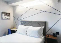  ?? THE NEW YORK TIMES ?? This room at the Chinatown Pod hotel in Washington, D.C., displays a streamline­d design that eliminates desks and closets, part of the changes that industry experts say are aimed at keeping pace with the changing needs of business travelers.