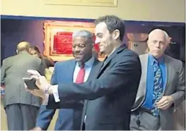  ?? ANTHONY MAN/STAFF ?? Rupert Tarsey, the controvers­ial secretary of the Broward Republican Party, holding phone, snaps a selfie with former U.S. Rep. AllenWest in Oakland Park on Saturday.