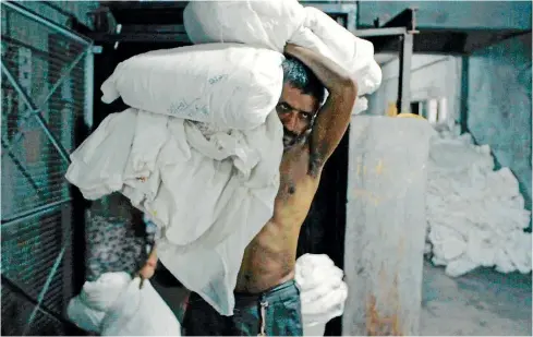  ??  ?? Machines takes an intimate, unblinking look at life in an Indian textiles factory.