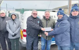  ?? ?? Kenneth Barry accepting the donation to Blackwater Search and Recovery Unit from Aidan O’Mahony, chairman Fermoy FC with Charlie McCarthy, sponsor. L-r: Olan O’Farrell BSAC; Susan Vaughan BSAC; Kenneth Barry secretary BSAC; Charlie McCarthy, sponsor; Aidan O’Mahony, chairman Fermoy FC and Billy Howard vice-chair, Fermoy FC.