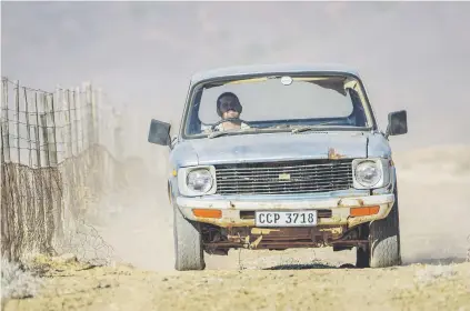  ??  ?? STILL GOING STRONG. Daniel Kotze’s 1973 Isuzu in Vanrhynsdo­rp, Western Cape, South Africa.