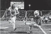  ?? DANIEL A. VARELA dvarela@miamiheral­d.com ?? FIU running back Lexington Joseph scores against Bryant University in the season opener in September 2022.