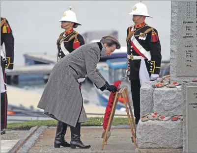  ??  ?? HRH The Princess Royal lays a wreath in Port Ellen.