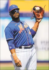  ?? Julio Cortez / Associated Press ?? Mets 2B Robinson Cano has been keeping busy during social distancing by working out, distributi­ng food and catching up with former major leaguers and teammates over Zoom.