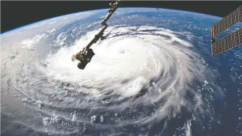  ??  ?? Imagen captada ayer por el astronauta Ricky Arnold desde la Estación Espacial Internacio­nal, que muestra una vista del ojo del huracán Florence.