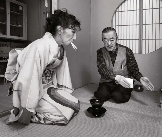  ??  ?? Retired friends practise rituals of the tea ceremony in a Tokyo community centre